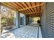 Underneath the house showcasing a patio with a geometric black and white tile pattern at 2514 Bullock Guard Dr, Johns Island, SC 29455