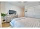Comfortable bedroom featuring a dresser with a television, and warm hardwood floors at 2905 Cavalcade Cir, Johns Island, SC 29455