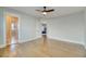 Spacious bedroom with gorgeous wood flooring and a ceiling fan offers ample natural light at 2905 Cavalcade Cir, Johns Island, SC 29455