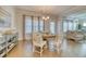 Cozy dining area featuring a round table and stylish chairs, with abundant natural light at 2905 Cavalcade Cir, Johns Island, SC 29455