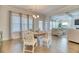 Bright dining area with a round table and stylish chairs, open to living space at 2905 Cavalcade Cir, Johns Island, SC 29455