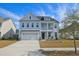 Charming two-story home with a two car garage, beautiful balcony and inviting curb appeal at 2905 Cavalcade Cir, Johns Island, SC 29455
