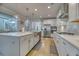 Elegant kitchen with an island, stainless appliances, and a light-filled space at 2905 Cavalcade Cir, Johns Island, SC 29455