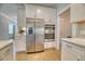 Modern kitchen featuring stainless steel appliances, white cabinets, and hardwood floors at 2905 Cavalcade Cir, Johns Island, SC 29455