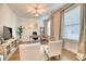 Comfortable living room with neutral decor, hardwood floors, and lots of natural light at 2905 Cavalcade Cir, Johns Island, SC 29455