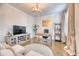 Comfortable living room with neutral decor, hardwood floors, and lots of natural light at 2905 Cavalcade Cir, Johns Island, SC 29455