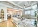 Bright open concept living room featuring hardwood floors and neutral decor at 2905 Cavalcade Cir, Johns Island, SC 29455