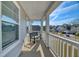 Relaxing covered porch with a bench overlooking the neighborhood at 2905 Cavalcade Cir, Johns Island, SC 29455