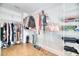 Spacious walk-in closet features ample storage and adjustable shelving for organization of clothes and accessories at 2905 Cavalcade Cir, Johns Island, SC 29455