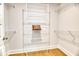 Empty walk-in closet with wood floors and white wire shelving ready for personal organization and storage at 2905 Cavalcade Cir, Johns Island, SC 29455