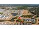 Aerial view of a lakeside community featuring a pond and fountain at 292 Lotz Dr, Summerville, SC 29483