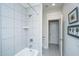 Well-lit bathroom showcases a tiled shower and tub combination, with neutral tones and functional layout at 292 Lotz Dr, Summerville, SC 29483