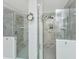 Spacious bathroom featuring double shower with glass doors, tiled walls, and tiled floors at 292 Lotz Dr, Summerville, SC 29483