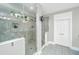Bright bathroom featuring double shower with glass doors, tiled walls, and tiled floors at 292 Lotz Dr, Summerville, SC 29483