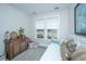 Comfortable bedroom with neutral walls, a daybed, and a large window at 292 Lotz Dr, Summerville, SC 29483