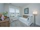 Cozy bedroom with a twin daybed, neutral decor, and ample natural light at 292 Lotz Dr, Summerville, SC 29483