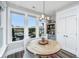Breakfast nook with large windows providing views of the lake and natural light at 292 Lotz Dr, Summerville, SC 29483