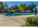 Large community pool with ample seating and shaded cabanas, offering a luxurious outdoor experience at 292 Lotz Dr, Summerville, SC 29483