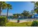Inviting community pool area with covered seating, lush greenery, and sunny lounge spots, ideal for relaxation at 292 Lotz Dr, Summerville, SC 29483