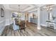 Elegant dining room with a decorative chandelier and natural wood floors at 292 Lotz Dr, Summerville, SC 29483