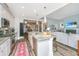 Open-concept kitchen with granite countertops, stainless steel appliances, and view to the living room at 292 Lotz Dr, Summerville, SC 29483