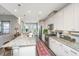 Open kitchen with stainless steel appliances, granite countertops, and a view to the breakfast nook at 292 Lotz Dr, Summerville, SC 29483
