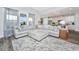 Spacious living room with a comfortable sectional sofa and views of the kitchen at 292 Lotz Dr, Summerville, SC 29483