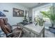 Home office boasts a leather chair, desk and natural light at 292 Lotz Dr, Summerville, SC 29483