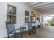 Charming front porch with rocking chairs and outdoor seating area at 292 Lotz Dr, Summerville, SC 29483