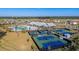 Aerial view showcasing the community amenities, with a focus on the pool and tennis courts at 302 Autumn Azalea Way, Summerville, SC 29486