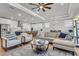 Inviting living area with open layout, stylish furnishings, and direct access to the kitchen and dining space at 302 Autumn Azalea Way, Summerville, SC 29486