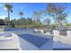 Outdoor kitchen area with built-in grill and countertop at Latitude Margaritaville Watersound at 302 Autumn Azalea Way, Summerville, SC 29486