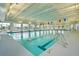 Well-maintained indoor pool provides a refreshing and convenient amenity for year-round swimming and exercise at 302 Autumn Azalea Way, Summerville, SC 29486
