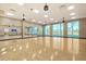 Light-filled dance studio with mirrored wall, ballet bar, and hardwood floors is perfect for fitness and recreation at 302 Autumn Azalea Way, Summerville, SC 29486