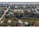 Aerial view of coastal neighborhood showcasing beach access and neatly arranged homes along the coastline at 308 Jungle Rd, Edisto Beach, SC 29438