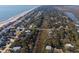An aerial shot of a beach town and the surrounding coastline at 308 Jungle Rd, Edisto Beach, SC 29438