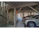 A spacious carport provides sheltered parking for multiple vehicles, with stairs and a door visible at 308 Jungle Rd, Edisto Beach, SC 29438