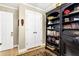 Office with a large bookcase and a closet at 308 Jungle Rd, Edisto Beach, SC 29438
