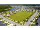 Aerial view of a community, lake, playground, and green space at 317 Pine Crest View, Summerville, SC 29486
