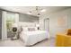 Bedroom with neutral wallpaper, large window, pendant light, and yellow dresser at 317 Pine Crest View, Summerville, SC 29486