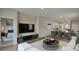 Open-concept living space with modern entertainment center that connects to the kitchen, perfect for gatherings at 319 Pine Crest View, Summerville, SC 29486