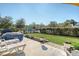 Beautiful backyard with a manicured lawn, hot tub, and lounge chairs at 3278 Great Egret Dr, Johns Island, SC 29455