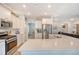 Modern kitchen with stainless steel appliances, granite countertops, and an open layout at 3278 Great Egret Dr, Johns Island, SC 29455