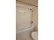 Bright bathroom showcasing a shower-tub combination with tiled surround, providing a relaxing and functional space at 330 Concord St # 4C, Charleston, SC 29401