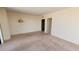 Neutral living room with carpet flooring and white walls at 330 Concord St # 4C, Charleston, SC 29401