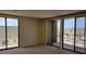 Bright and airy living room features large sliding doors leading to a balcony at 330 Concord St # 4C, Charleston, SC 29401