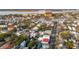 Here's a lovely aerial view of the beautiful historic neighborhood of Charleston, South Carolina with a large lake in the background at 4 Trapman St # B, Charleston, SC 29401