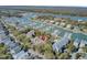 An aerial view of the property featuring mature trees and waterways at 409 Yacht Harbor Ct # 409, Isle of Palms, SC 29451