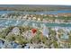 An aerial view of the property featuring mature trees and waterways at 409 Yacht Harbor Ct # 409, Isle of Palms, SC 29451