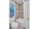 This bathroom features a shower and bathtub combination behind a white shower curtain at 409 Yacht Harbor Ct # 409, Isle of Palms, SC 29451